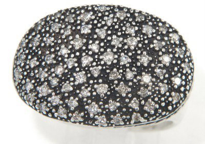 David Yurman Silver Diamond Ring: David Yurman Silver Diamond Ring. The total ring's weight is 13.6 grams. The total weight of diamond is 0.55cts. approximately , H - I color VS - SI clarity. The size of the ring's surface is 17 x 23 