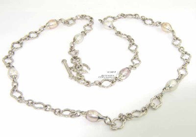 Charles Krypell Silver Pearl Necklace: Charles Krypell Silver Pearl Necklace Weight of necklace: 78.1 grams. The measurement of pearl: 8 x 9 mm. The length of necklace: 35". The necklace is 9 mm wide.