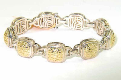 Charles Krypell 14K Gold Silver Bracel: Charles Krypell 14K Yellow Gold Silver Bracelet Weight of Bracelet: 32.2 grams. The length of Bracelet: 7". The bracelet is 11 mm wide and 5 mm in thickness.