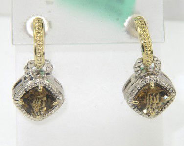 Charles Krypell Gold / Silver Citrine Earrings: Charles Krypell 14K Yellow Gold / Silver Citrine Earrings The weight of the Earring is 9 grams. The size of Citrine is 7 x 7 mm. The size of the earring is 25 x 12 mm , 7 mm in thickness.