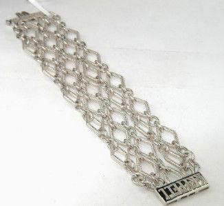 Charles Krypell Gold/Silver Bracelet: Charles Krypell 14K Gold/Silve Bracelet Weight of Bracelet: 65.7 grams. The length of Bracelet: 6.75" The bracelet is 36 mm wide and 1 mm in thickness