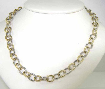 David Yurman Silver/18K Yellow Gold Necklace: David Yurman Silver/18K Yellow Gold Necklace The total weight of Necklace is 32.2 grams. The length of the necklace is 16.5". The necklace is 7 mm wide and 1 mm in thickness.