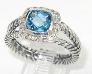 David Yurman Silver Blue Topaz & Diamond Ring: David Yurman Silver Blue Topaz & Diamond Ring The total ring's weight is 5.4 grams The total weight of the diamond is 0.2 cts approximately, I color SI clarity The size of the blue topaz is 7 x 7 mm T