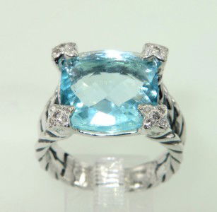 David Yurman Silver Blue Topaz Diamond Ring: David Yurman Silver Blue Topaz Diamond Ring The total ring's weight is 9.2 grams. The total diamond weight is 0.10 cts.,approxmiately. I color SI clarity. The size of Blue Topaz is 14 x 14 mm. The siz