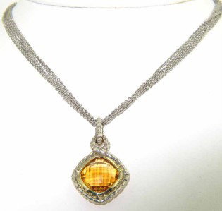 Charles Krypell Silver/ 14K Gold Citrine Necklace: Charles Krypell Silver/14K Gold Citrine NeckalceThe weight of the Necklace is 12.4 grams. The size of citrine is 10 x 10 mm. The necklace is 16.5" long. The measurements of pendant: 32 x 19 mm and 6 m