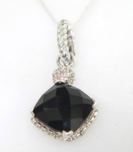 David Yurman Silver Onyx & Diamond Pendant: David Yurman Silver Onyx & Diamond Pendant The total Pendant's weight is 3.1 grams. The total weight of diamond: 0.08 cts. approximately. I color SI clarity. Pendant size is 28 x 13 mm, 4 mm thick. Th