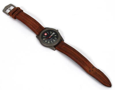 Wenger Swiss Army Men's Quartz Wrist Watch Circa 1970s: Wenger Swiss Army SAK Men's Quartz Wrist Watch Circa 1970s. Stainless steel, 37MM, luminous, second hand, date display, water resistant 50M. Swiss made. Working. Original 9" leather strap. P3873/AAX