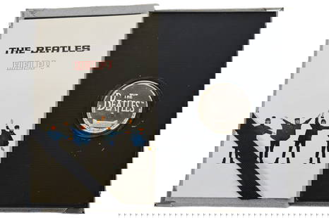 Beatles 1990 HELP! Limited Edition Silver Coin Collectable: The Beatles 1990 Limited Edition .999 Silver Coin in Specialty Case Numbered 5534 commemorating the 25th Anniversary of their album HELP! S/
