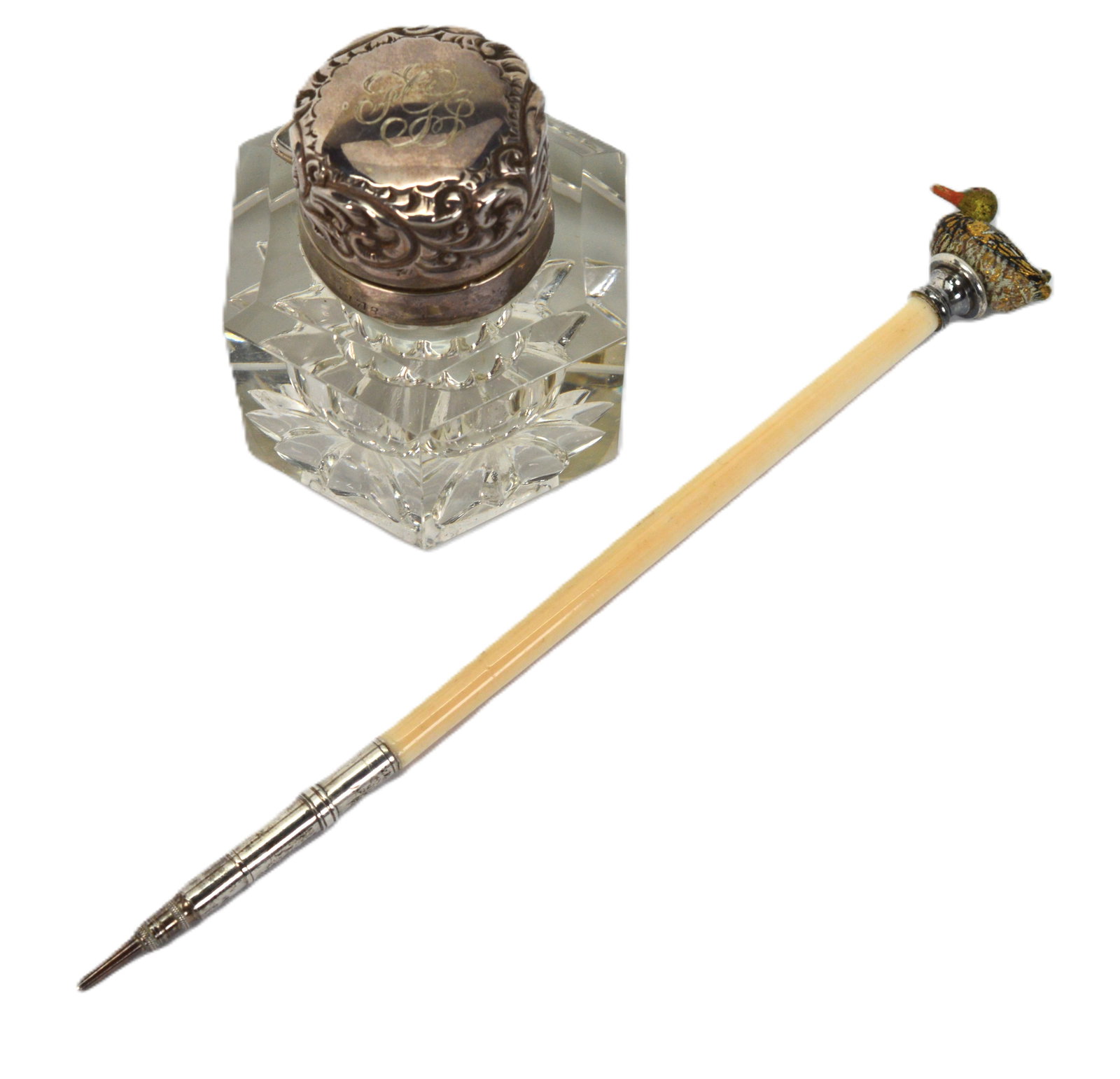 Antq Victorian Sterling & Crystal Ink Well & Antq Dip Pen: Antique Victorian Sterling Silver & Cut Crystal Ink Well w Antique Bone Dip Pen w Duck Finial. The finial was gently cleaned to reveal the details. Ink well is 2.75" high, 2.5" in diameter. The dip pe