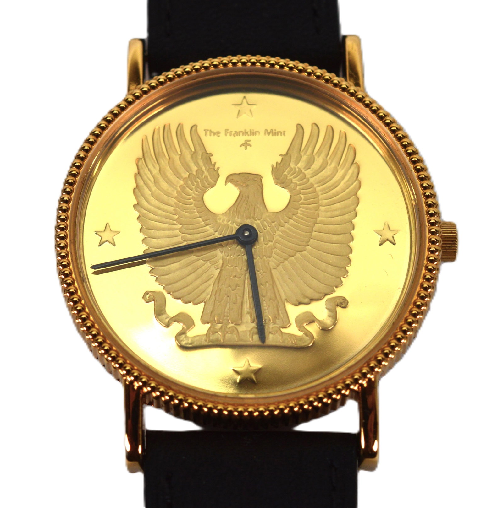American Eagle 24K GP Sterling Wrist Watch: American Eagle 24K Gold Plated Wrist Watch by The Franklin Mint. Designed by Gilroy Roberts. The watch has a precision Swiss quartz movement and a black Buffle Nautic 8.5" strap. The watch is 32.5MM w