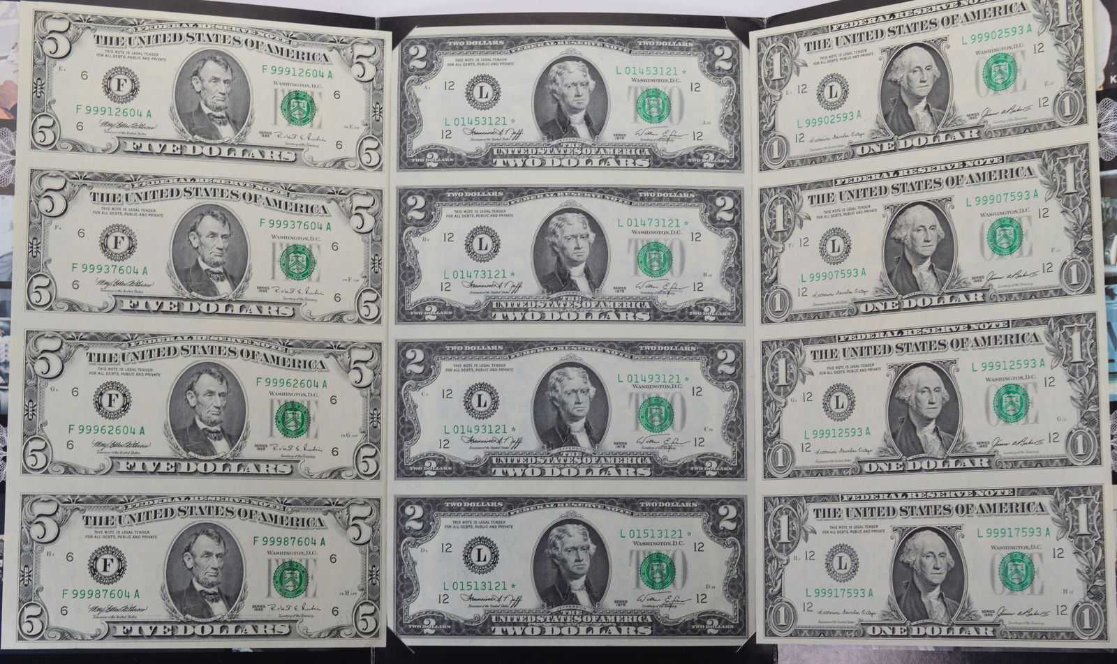 US Currency Uncut Sheets $5, $2, $1 Dollar Bills Bureau of Engraving & Printing Portfolios: Lot - Bureau of Engraving & Printing US Currency Uncut Currency Sheets in Portfolios. Four Uncut Bill Per Sheet/Set.Includes Two Sets of $1 Bills, Two Sets of $2 Bills and One Set of $5 Bills / 1995.