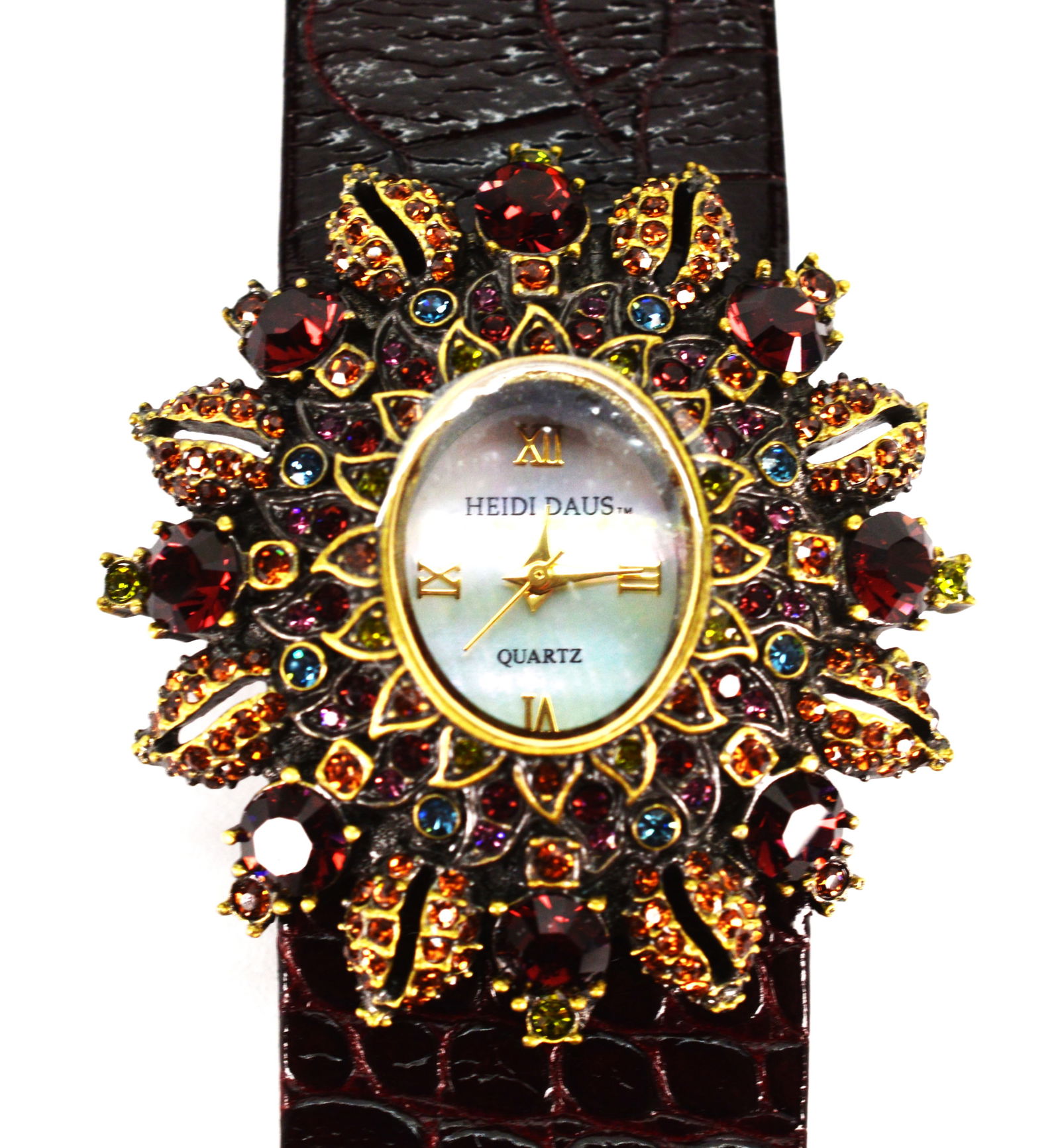 Heidi Daus Winter Colorway Crystal Quartz Watch: Heidi Daus Winter Colorway Crystal Quartz Watch with Leather Burgundy Strap. The strap is 9" long and 1" wide. The floral quartz watch has stunning winter tone colors. It is 1.5" long and 1.75" wide w