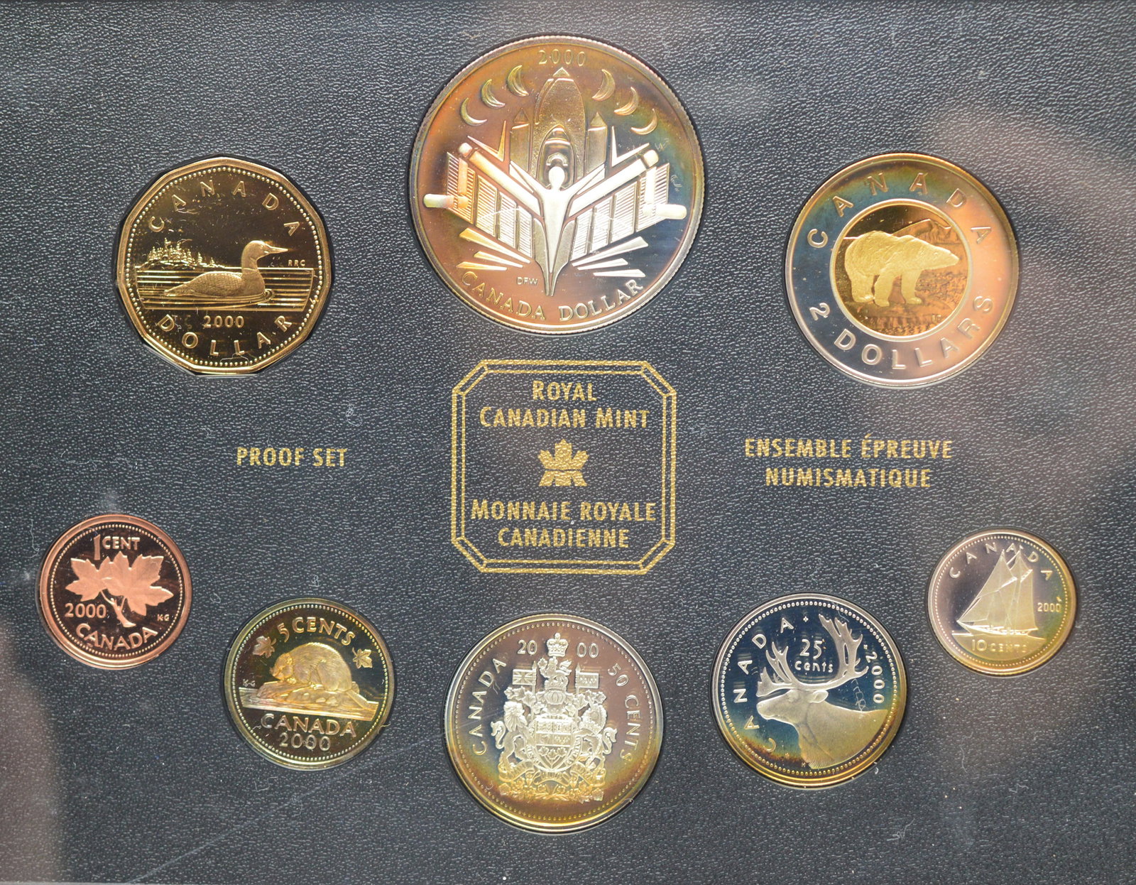 2000 Royal Canadian Mint Proof Coin Set Voyage of Discovery: This Canadian Silver Proof set was made to commemorate Canada's voyage of discovery into the new millennium, as stylized by the space motifs. Included in this eight coin set are Sterling Silver issues