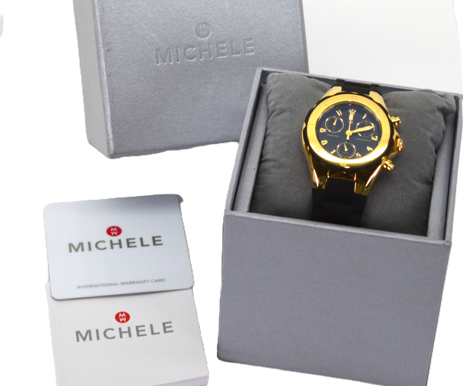 Michele Jelly Bean Tahitian Chronograph Ladies Wrist Watch NWOT: The Michele Jelly Bean Tahitian Chronograph Ladies Wrist Watch is a luxurious timepiece designed for women. This watch features a red gold bezel and a 38mm gold case with Arabic numeral indices. The w