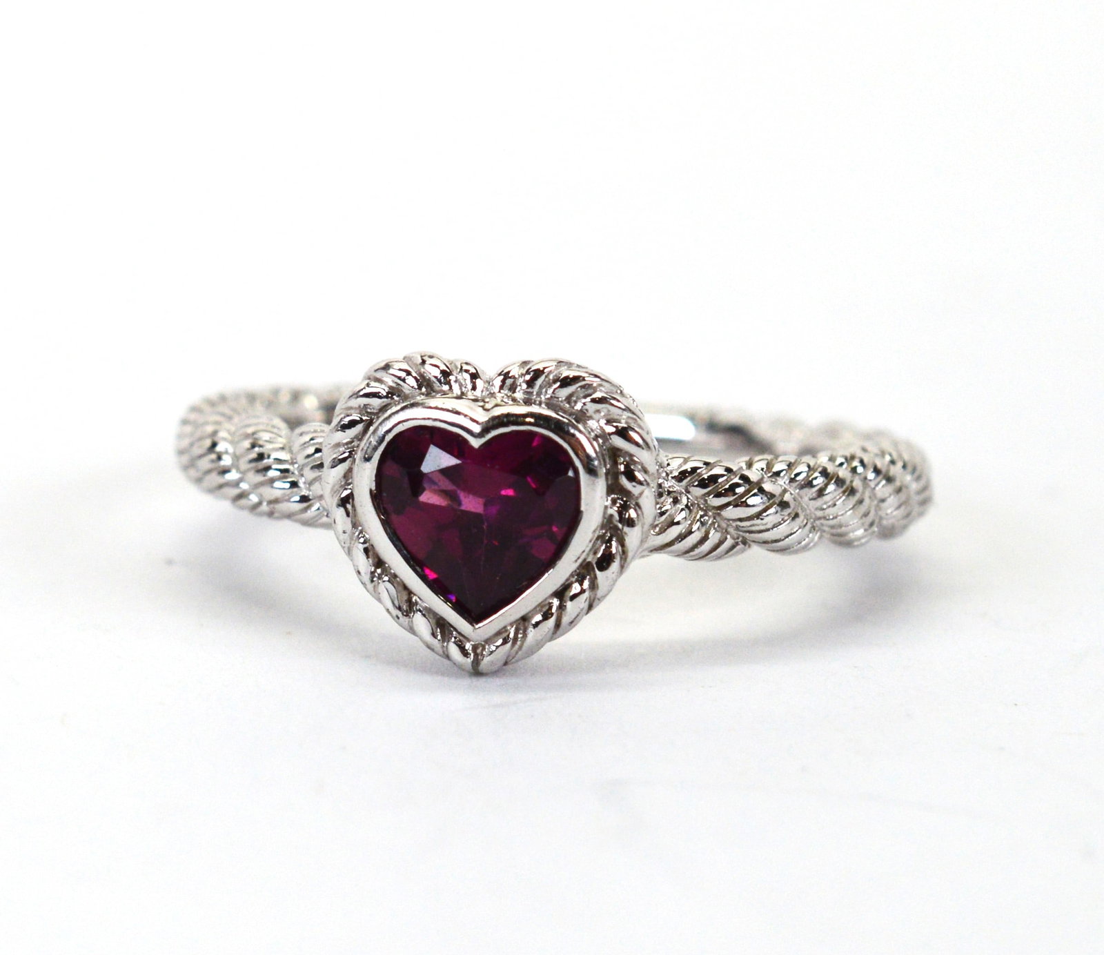 Judith Ripka Garnet Sterling Silver Heart Ring Size 8: Judith Ripka Rhodolite Garnet Sterling Silver Heart Ring in Size 8. This is a beautiful ring with a gorgeous bezel set garnet heart on a cable twist ring. Mother's Day is coming up! S/CAAX