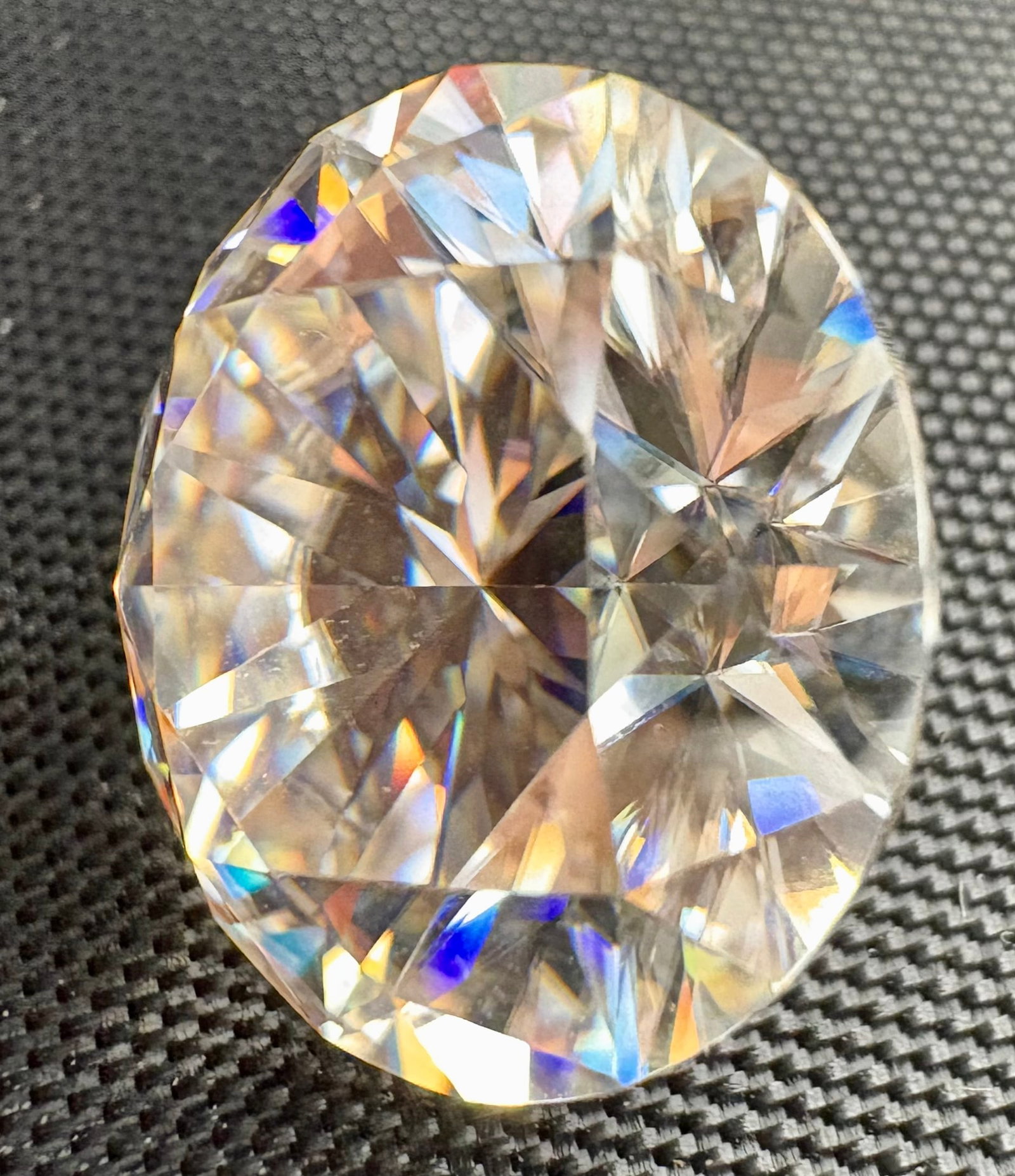5.0ct Round Brilliant Moissanite – 11.0mm – GRA Certified: 5.0ct Round Brilliant Moissanite – 11.0mm – GRA CertifiedLoose moissanite stone weighing 5.0 carats, round brilliant cut, 11.0mm in diameter, color grade IJ. Comes with labeled bag and official GR