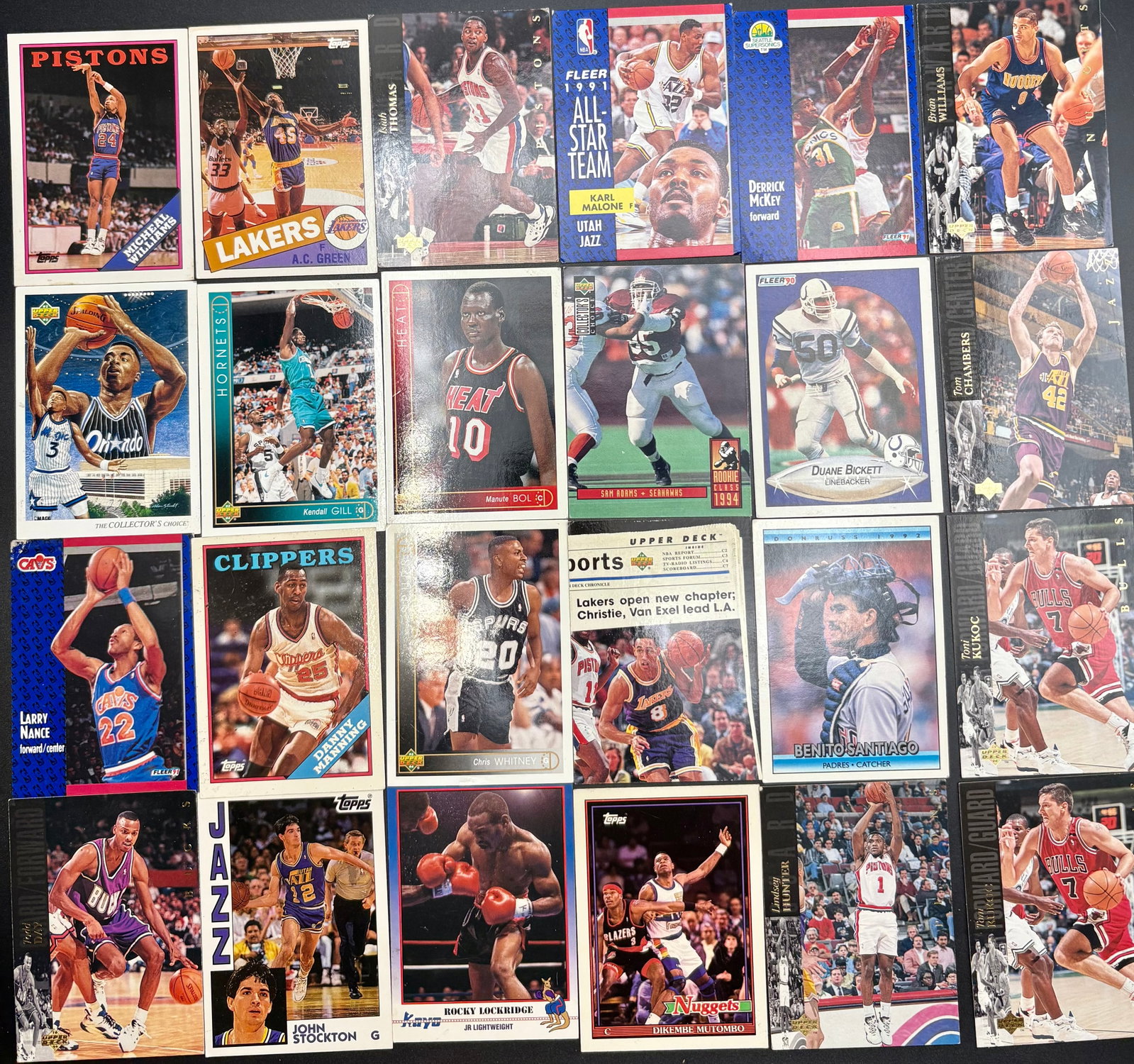 Mixed lot of vintage collectible cards featuring stars from basketball, football, baseball: Mixed lot of vintage collectible cards featuring stars from basketball, football, baseball, and boxing. Includes cards of legendary players such as Karl Malone (All-Star Team), John Stockton (Jazz), T