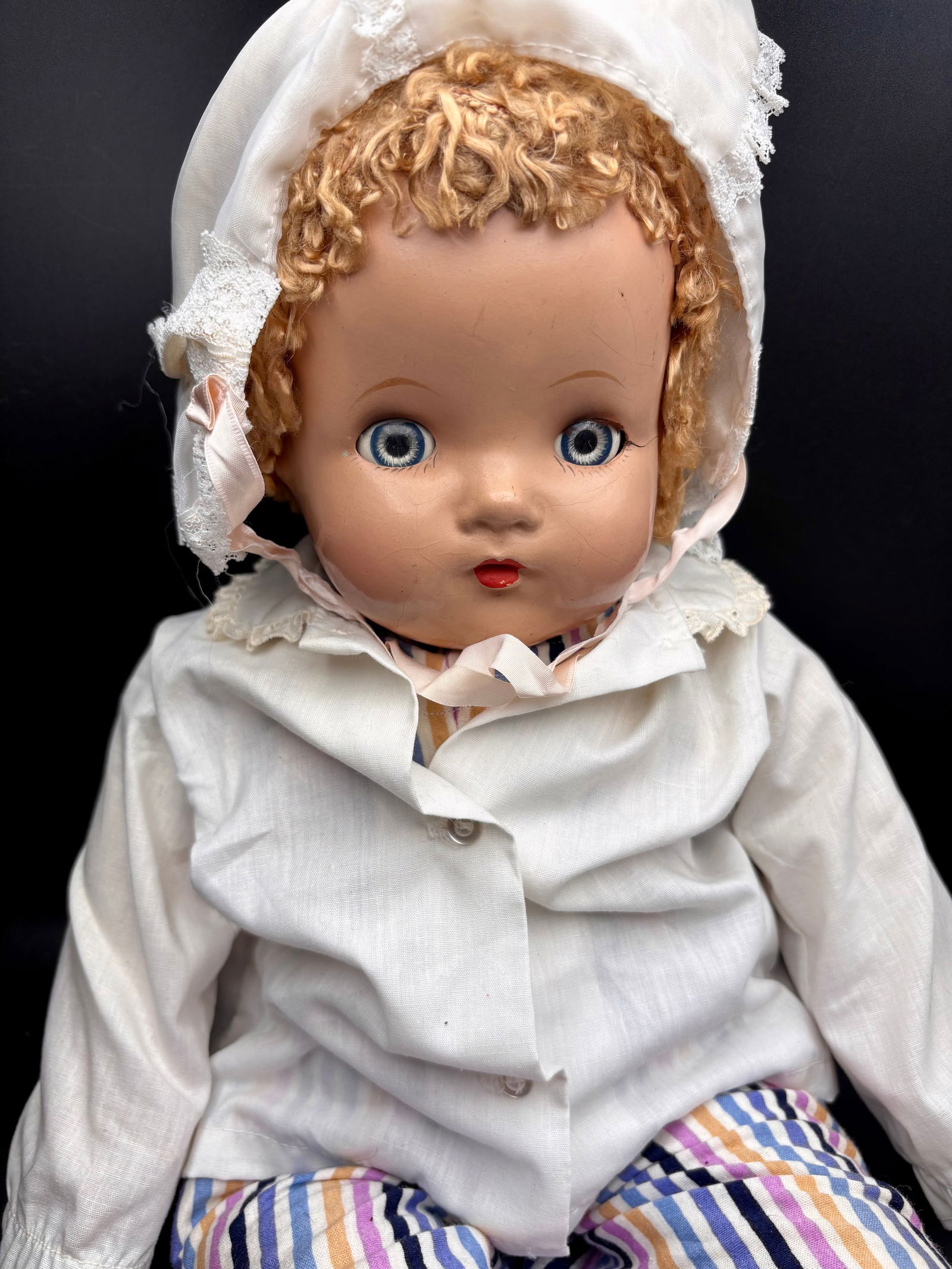 Vintage Composition Doll with Curly Hair and Bonnet (1 of 3)