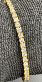 Gold Tennis Bracelet with Colorless VVS Stones