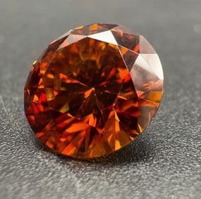 Round Orange-Red Faceted Stone with GRA Certification