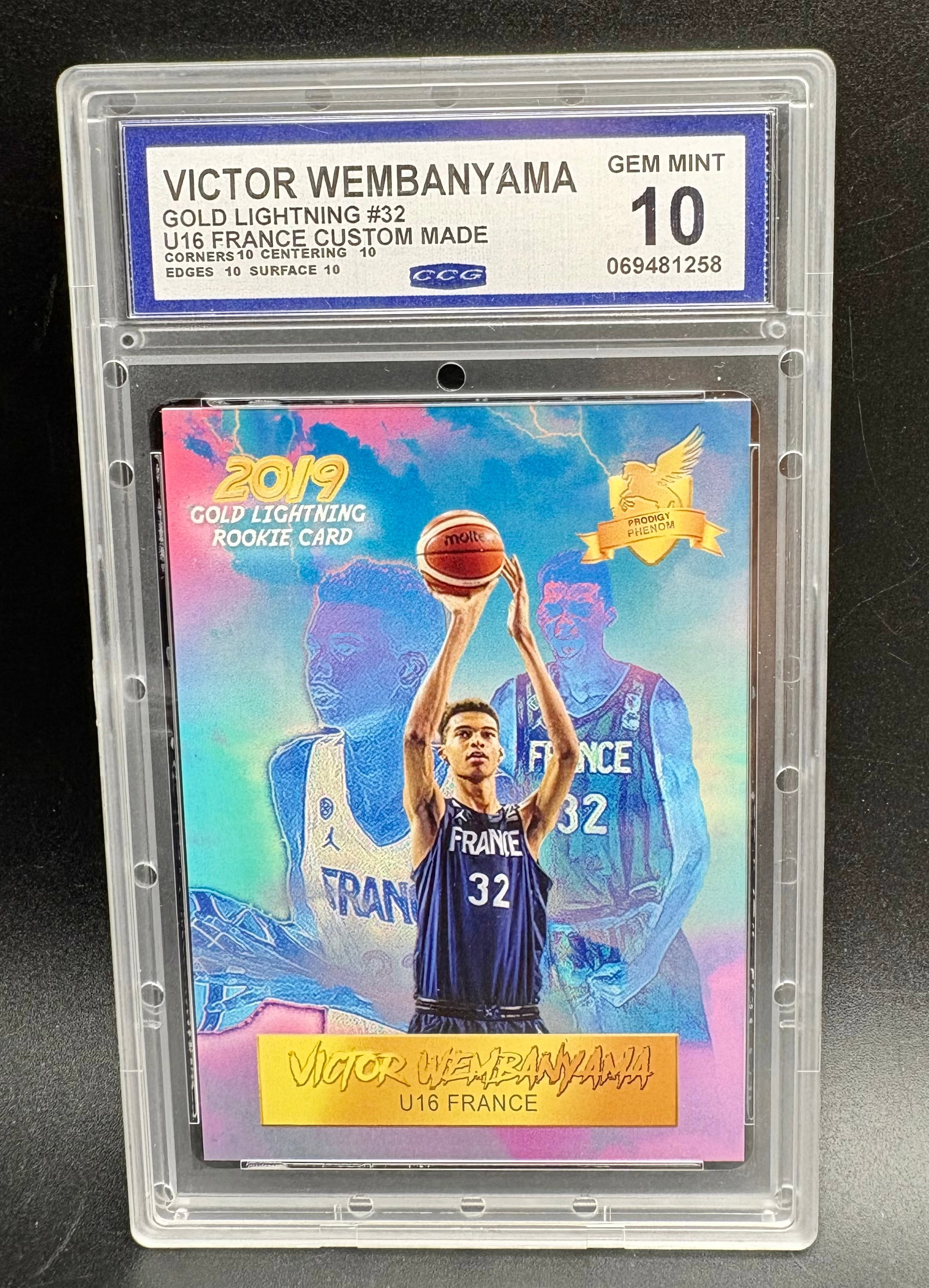 Victor Wembanyama 2019 Gold Lightning U16 France Custom Made Rookie Card: Basketball collectible card featuring Victor Wembanyama representing France U16, from the 2019 Gold Lightning Rookie Card design. The card displays a colorful lightning-themed background with multiple