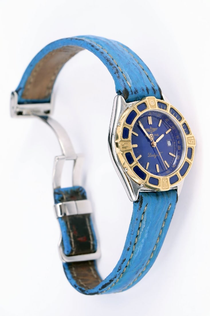 Breitling, “Lady J” wristwatch, blue dial: Breitling, “Lady J” wristwatch, blue dial and blue enamel bezel, large seconds hand, date display, watch is running (movement not tested), diameter 3.1 cm, Breitling clasp, worn bracelet,