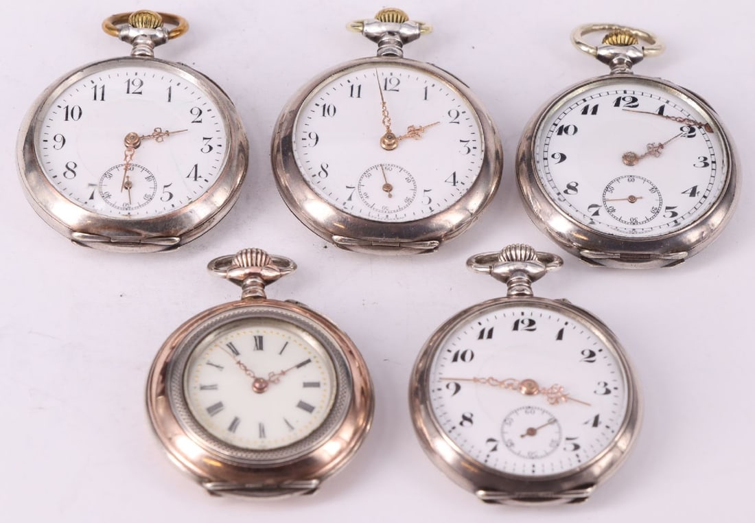 5 small pocket watches with religious motifs (1 of 3)