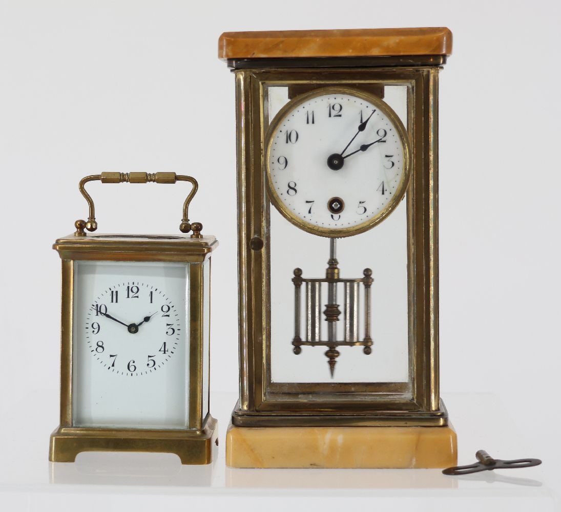 2 clocks, brass, glazed on four sides (1 of 3)
