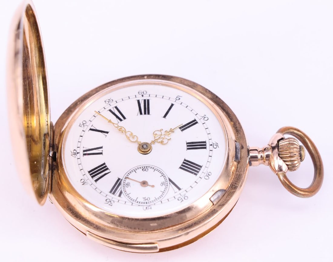 Pocket watch, 585 gold, 74 g. Dial with Roman numeral: Pocket watch, 585 gold, 74 g. Dial with Roman numerals, small seconds, minute repeater, star and stone on the back, watch runs (movement not tested), diameter 4.7 cm.Taschenuhr, 585er GG, 74 g. Ziffer