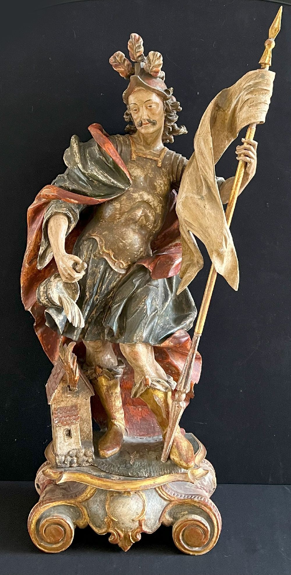 Southern Germany, 18th/19th century, Saint Florian: Southern Germany, 18th/19th century, Saint Florian with water bucket, wood, painted, signs of age, H 110 cm, W 57 cm. The patron saint against fire was particularly venerated in Austria, Bavaria, Bohe