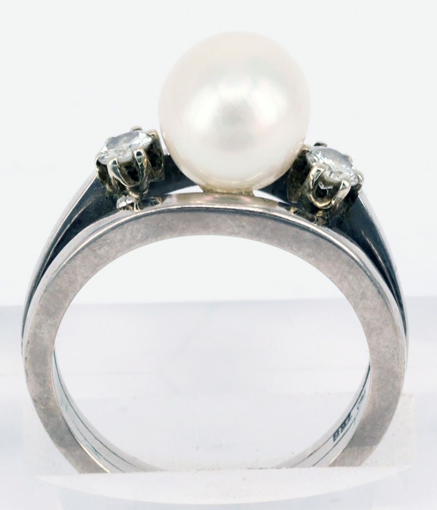 3 rings, all gold, showing signs of wear. - 2
