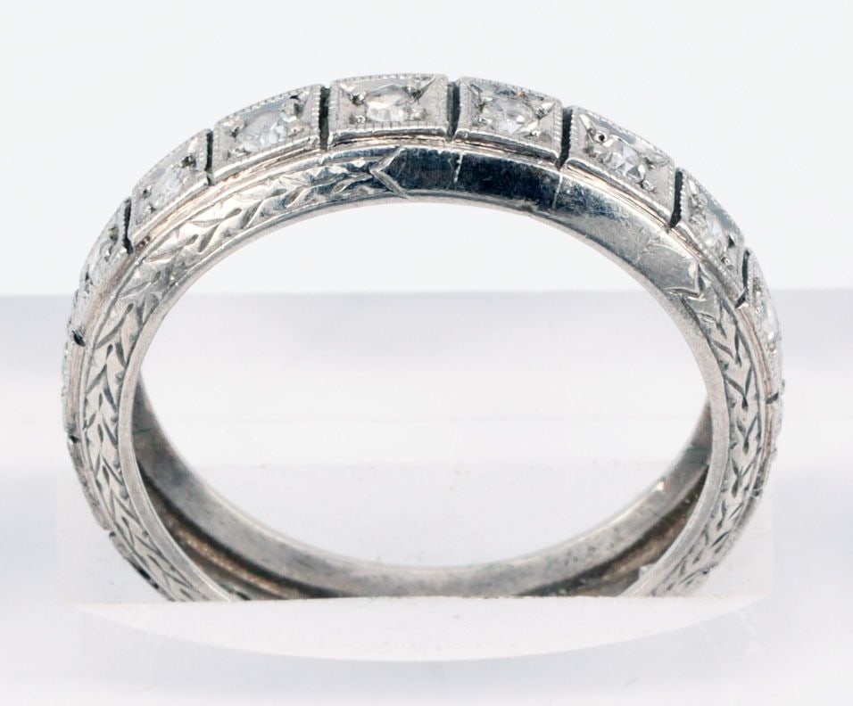 3 rings, all gold, showing signs of wear. - 3