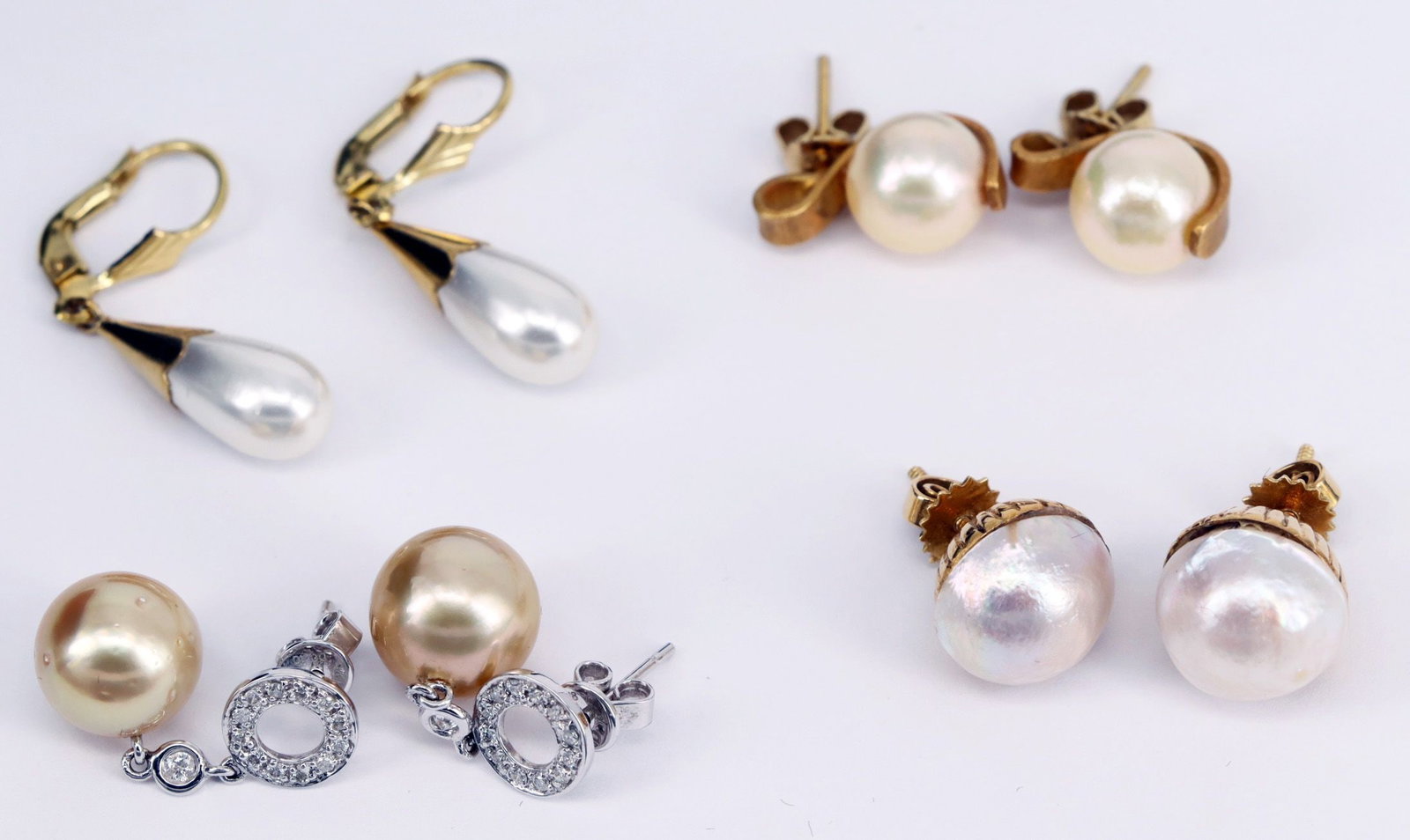 A lovely set of four pairs of earrings, signs of wear - 4