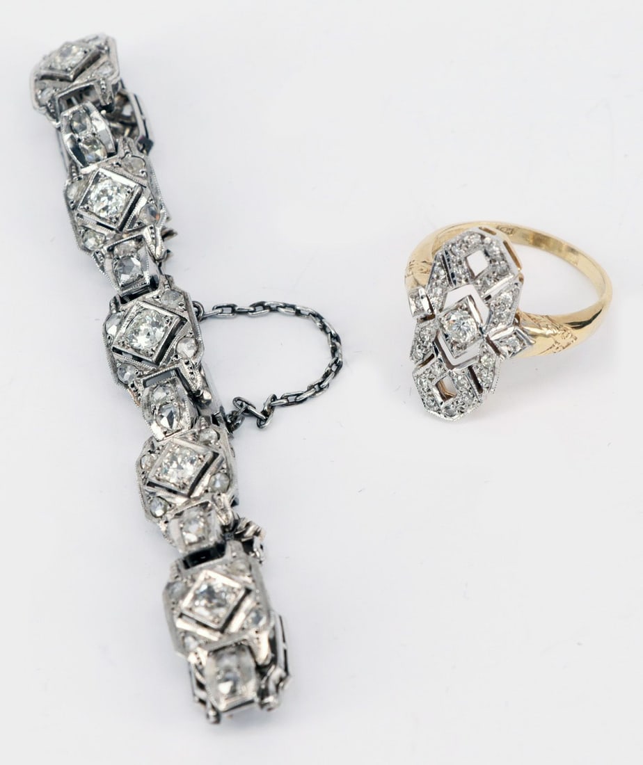 Two pieces of jewelry, Art Deco: Two pieces of jewelry, Art Deco: Bracelet, 14.25 g, set with 8 large diamonds in a square setting and 46 additional diamonds, length approx. 16 cm; Ring, 585 gold, 3.95 g, with diamonds (tested),