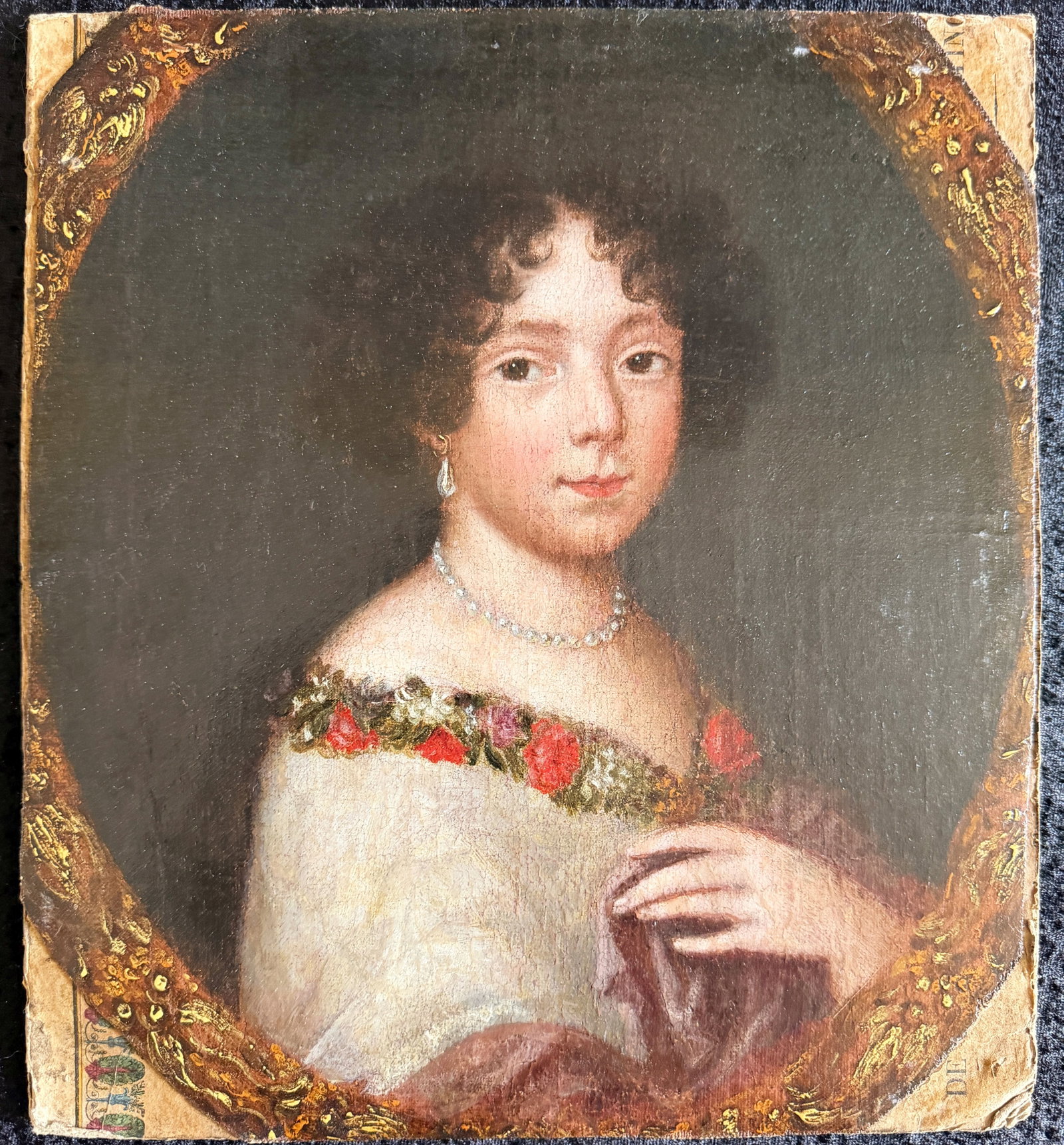 Pierre II MIGNARD (1640-1725) attr. Portrait: Pierre II MIGNARD (1640-1725) attributed, Portrait of a dark-haired lady with a pearl earring and pearl necklace; the light-colored dress features a floral border, oil on canvas (lined on cardboard),