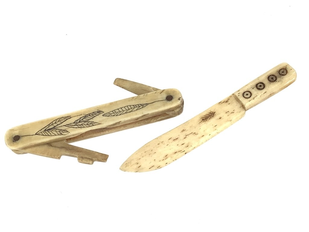 Antique Carved Bone Novelty Knives: 2 3/4"L bone knife with circle carvings.2 1/2"L carved bone 'pocket knife' with two swinging parts, 4 1/4"L at full extension. Antique estate Ivory collected pre-ban; not available for shipment intern