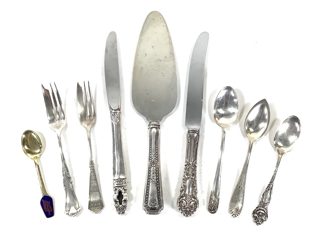 Sterling Flatware +: 9"L butter knife, marked 'Reed & Barton Mirrorstele, Sterling Handle'.9"L butter knife, marked 'Gorham, Sterling Handle, Stainless Blade'. 10 1/4"L cake spatula, marked 'Sterling, SSMC' on the handle.