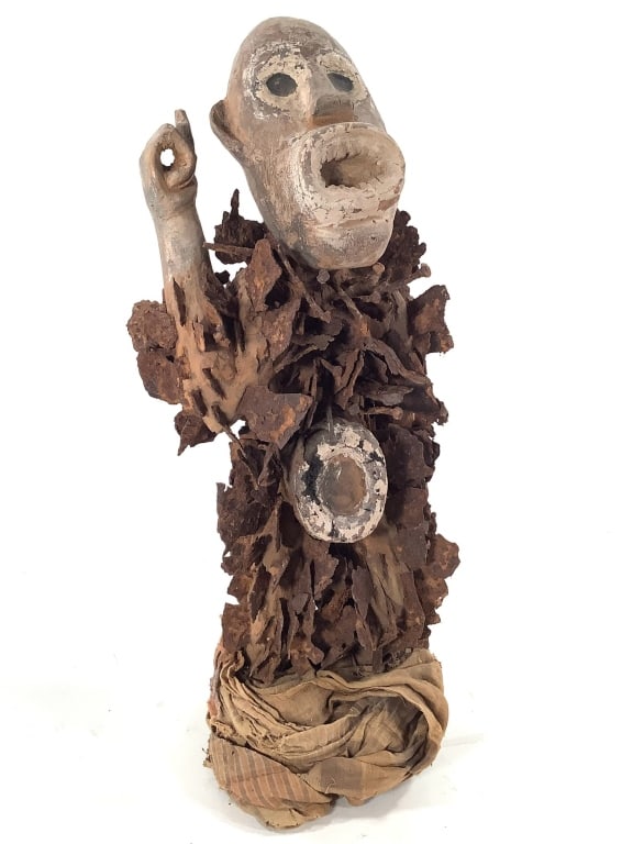 Nkisi Nkondi Replica With Metal Sheets: 18 1/2"H. Provenance: Collected by Sophia and Roy Sieber.