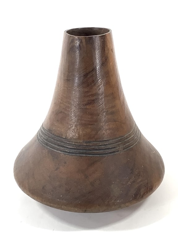 Wood Bottle From Hima Uganda: 9" Dia., 8"H. Provenance: Collected by Sophia and Roy Sieber.