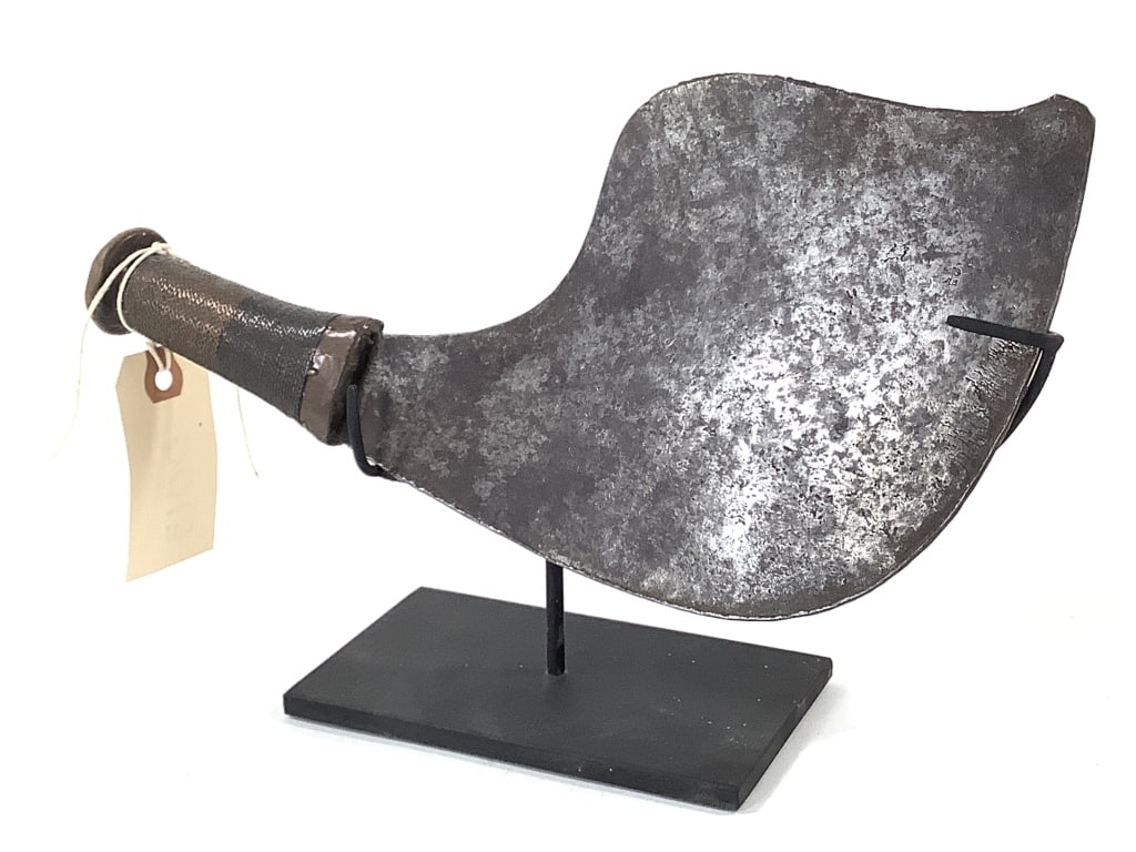 Ceremonial Knife From The DRC: 10"L x 5 1/2"H. Metal wrapped handle with metal stand. Provenance: Collected by Sophia and Roy Sieber.