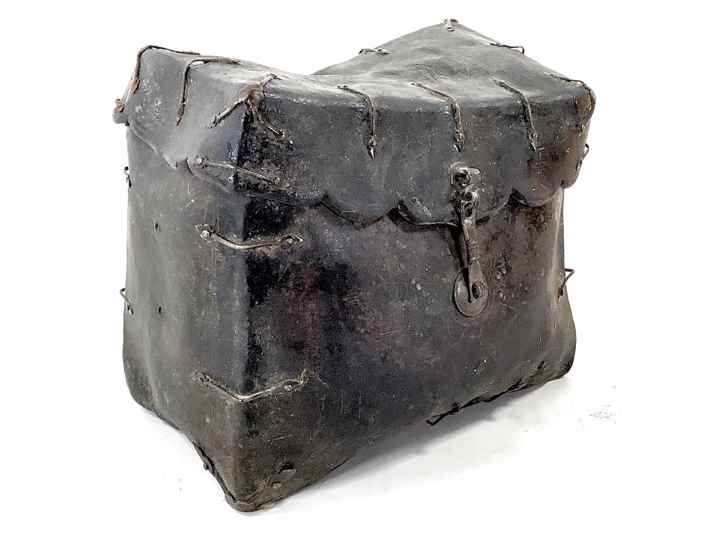 Leather And Metal Box: 10"L x 6"W x 9"H. Leather with metal reinforcements, unmarked. Provenance: Collected by Sophia and Roy Sieber.