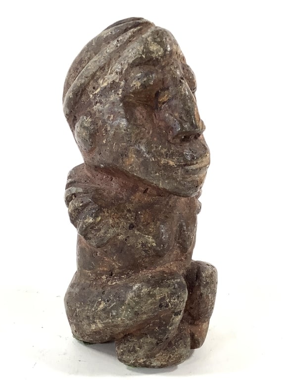 Copy Nomoli Stone Figurine Of The Sapi People: 6"H. Sierra Leone, made by the Sapi people, later found by the Mende people and used as oracles, rice gods, and protective wards. Provenance: Collected by Sophia and Roy Sieber.