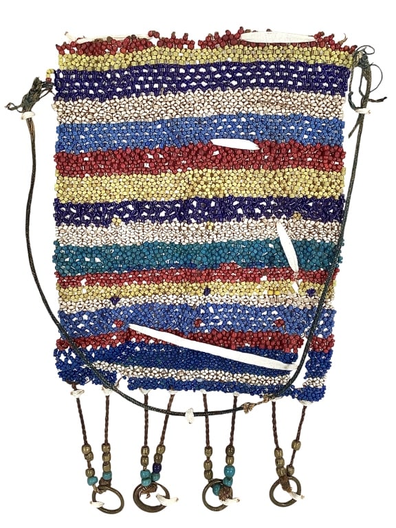 Beaded Segment With Brass Loops: 15"H x 9"W beaded segment of an item., secured to a board. Provenance: Collected by Sophia and Roy Sieber.