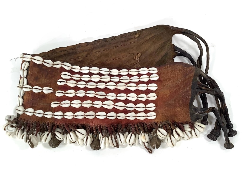 Leather And Cowrie Shell Belt: 31"L x 5"W. Provenance: Collected by Sophia and Roy Sieber.