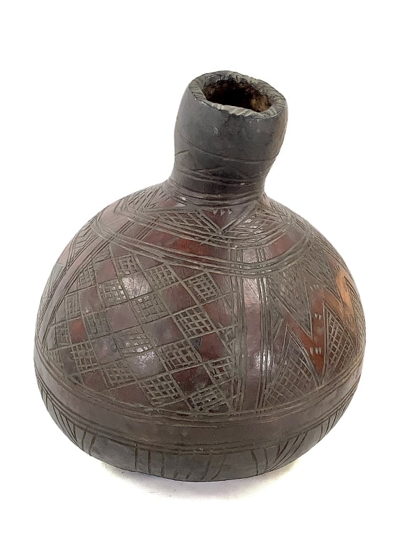 Calabash Carved Gourd: 12"Dia., 17"H. Provenance: Collected by Sophia and Roy Sieber.