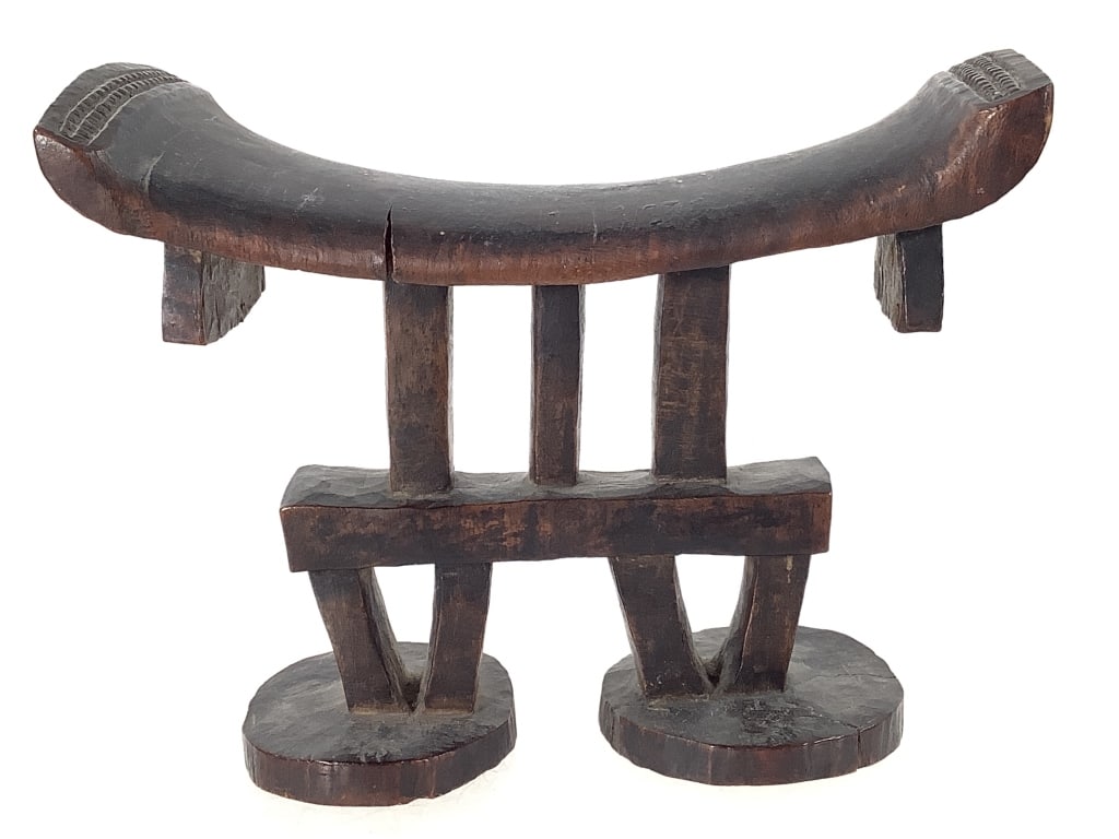 Shona Headrest From South Africa: 8"L x 6"H, small crack on the headrest. Provenance: Collected by Sophia and Roy Sieber.
