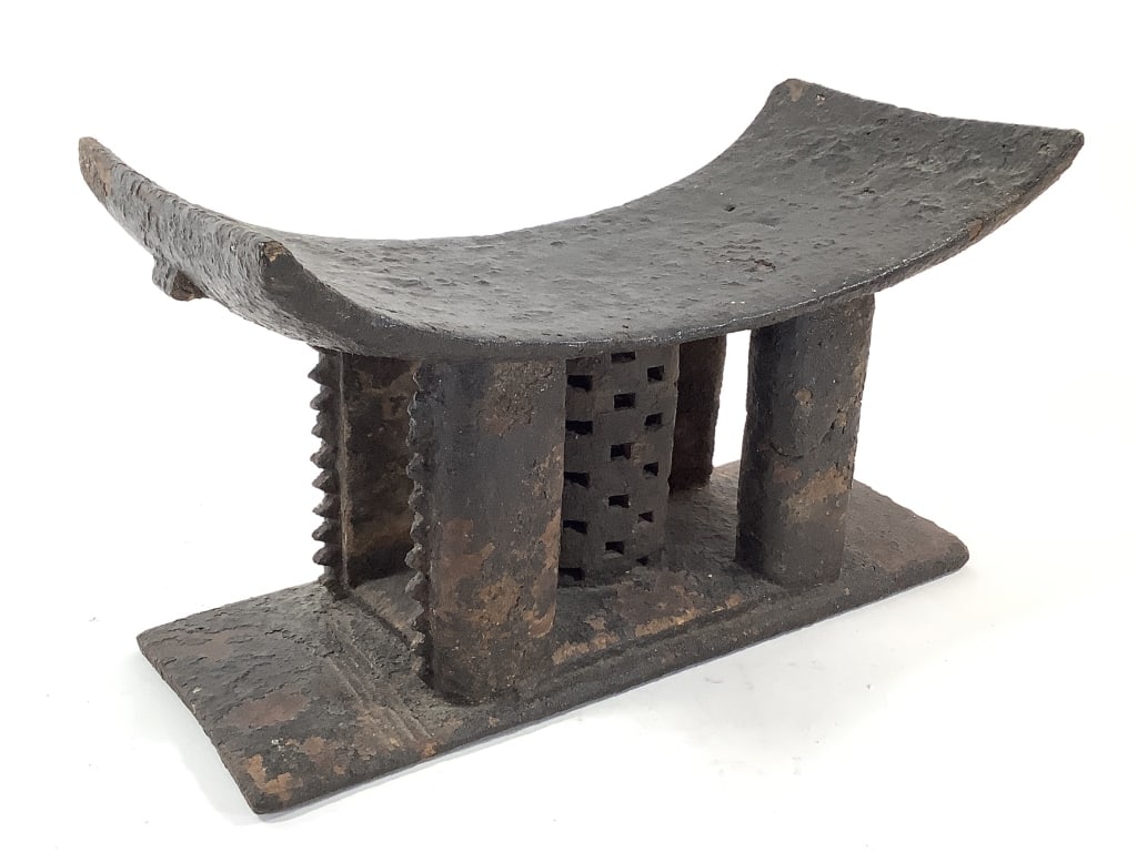 Wood Carved Stool: 15"L x 8 1/2"H, fading wood finish. Provenance: Collected by Sophia and Roy Sieber.