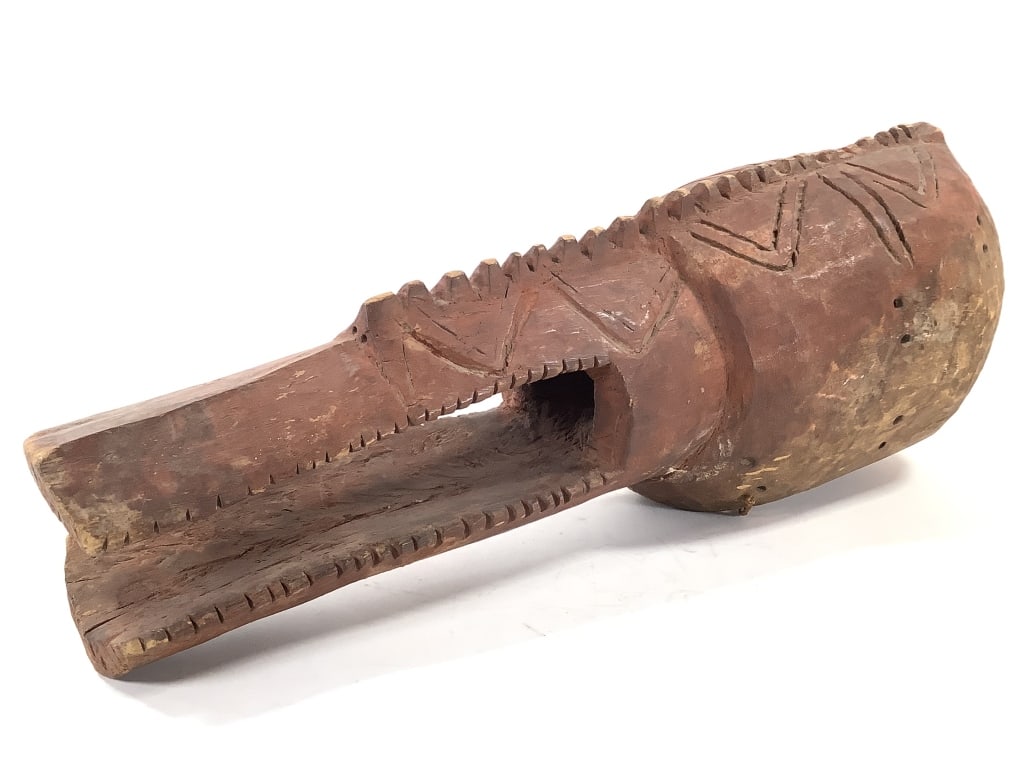 Nigerian Namni Mask By A Montol Carver: 26"L x 8"W. Made for a Goemai cheif, mask is also called Gugwom. Provenance: Collected by Sophia and Roy Sieber.