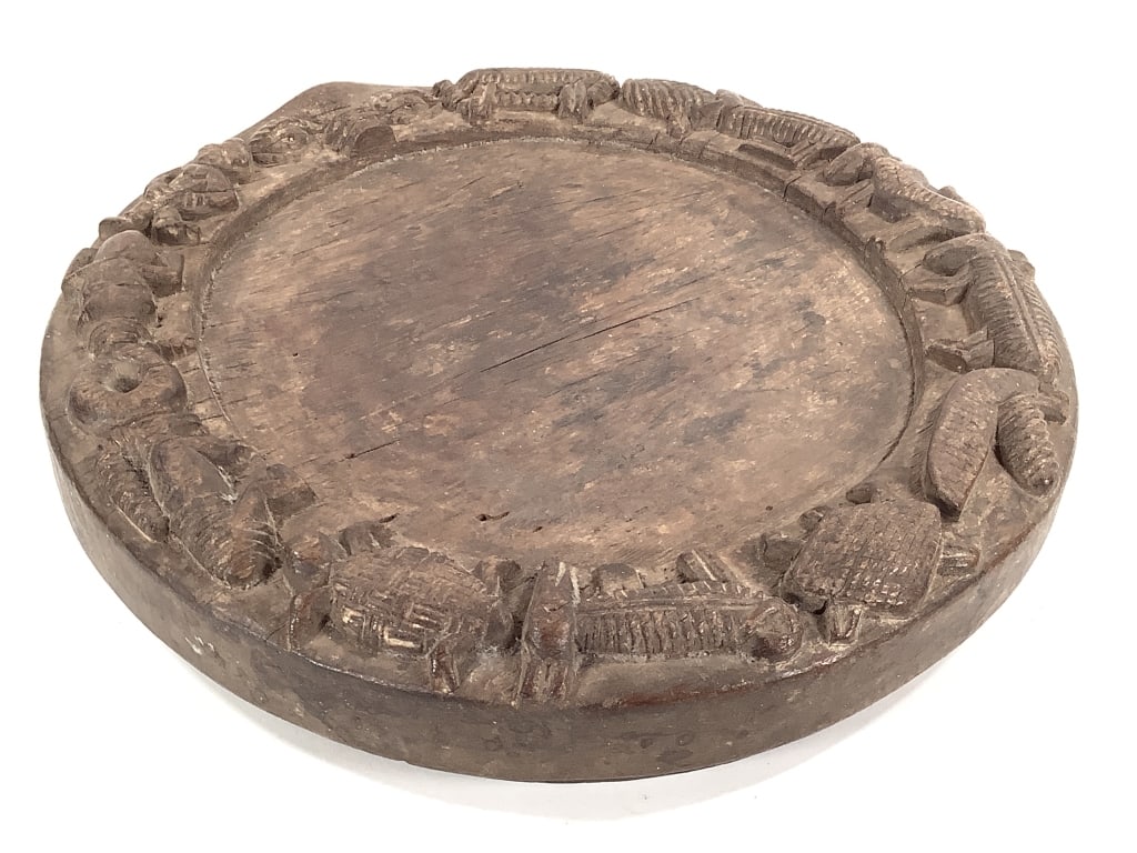 Ate Ifa Divination Tray: 17" Dia., carved motifs throughout. Provenance: Collected by Sophia and Roy Sieber.