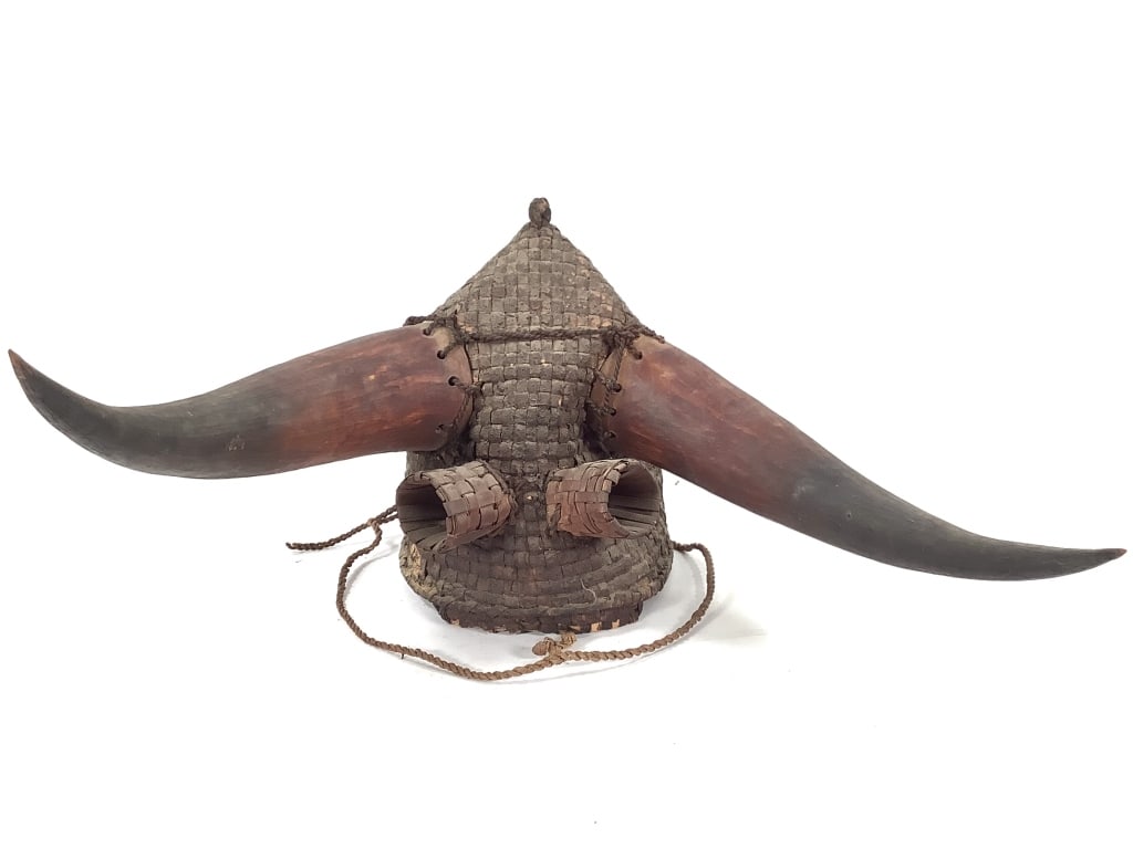 Horn And Basketry Helmet: 18"L x 16"W. Provenance: Collected by Sophia and Roy Sieber.